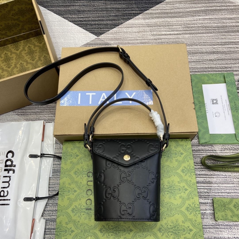 G*u*i top handle bags